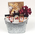 A designer silver gourmet gift basket tin filled with a variety of Greaves Jams from Niagara on the Lake together with lovely Cider Keg sparkling jellies, and a lovely box of European chocolates.
