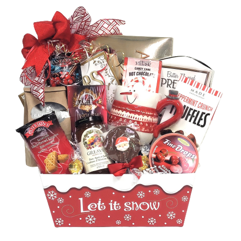 Let it Snow! This pretty market tray is loaded with lots to keep them warm and cozy. It's loaded with hot chocolate, coffee, tea, cider, truffles, pretzels, jam, and more along with a pretty keepsake Christmas mug. (Mug designs may vary)