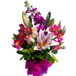 Pretty flowers nestled in a glass vase brimming with an assortment of roses, alstromeria and more with lush greens to make it complete.