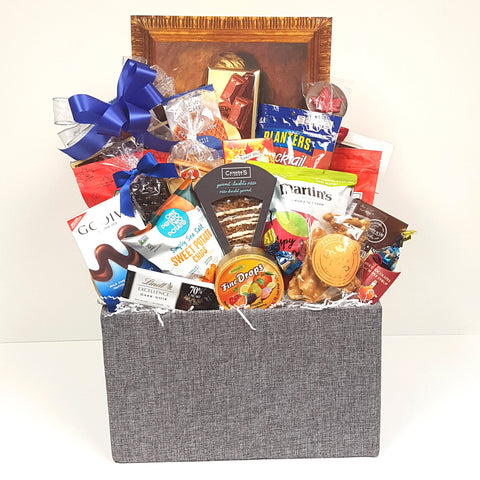A sweet & salty gift basket loaded with Canada's Finest gourmet chocolate pizza, European chocolates, peanut brittle, Cookie It Up shortbread, fine candy drops, Godiva chocolates, crunch cookies, cocktail peanuts, Martin's apple crisps and lots more. 