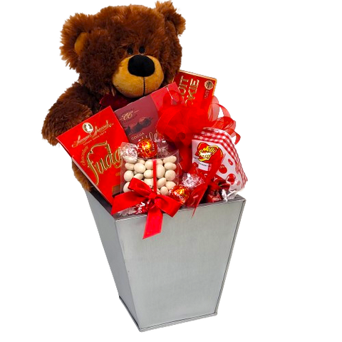 This special bear delivers lots of snuggles and delicious treats to enjoy from truffles, candies, cookies & more!  It's Beary-Licious for sure!  