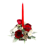 This centrepiece is a pretty floral arrangement to be enjoyed by candlelight to add a soft touch of tenderness to the festivities.