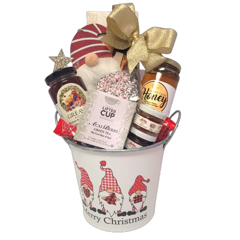 They'll enjoy a wonderful Christmas breakfast with a warm cup of tea, some delicious jams and honey and of course a touch of sweet treats and a keepsake ornament to keep. A wonderful gift basket to receive!