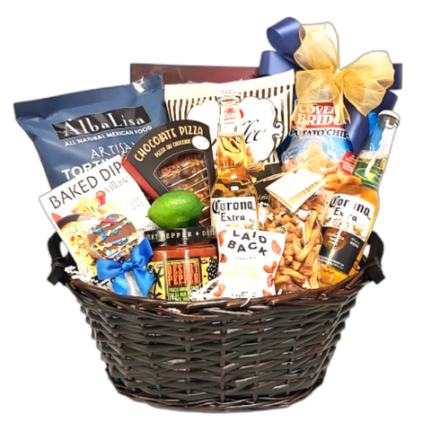 A curated Father's Day gift basket filled with beer, tortilla chips and salsa, chocolate, chips, pretzels, nuts and more.