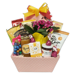 This pretty pastel Easter gift basket is brimming with loads of delights to savour. There's chocolates, cookies, Innisfil Creek honey, Lifted Cup tea, apple chips, crackers, chocolate pizza, jam and more along with a pretty plant to enjoy once all the treats are gone!