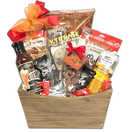 Wooden crate filled with Dad's favourites. There's chips, caramel corn, pretzels, BBQ sauce, shortbread and more along with some beer and a beer glass of course.