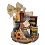 Perfect for entertaining! This classic acacia wood charcuterie board is brimming with artisanal salami, olives, mustard, cheese topping, crackers, brie and other gourmet delights. To complete this gift, there's a holiday ornament and a beautiful cheese knife set.