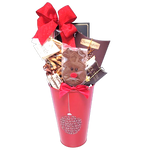 Our pretty Happy Holidays container is filled with lots of sweet treats to enjoy. There's brittle, pretzels, chocolate and candy too! A special gift basket that makes a great hostess gift to show your thanks!