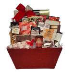 Home for the Holidays is the best place to be! Indulge them with all the tasty treats in this overflowing gift basket of goodies. They'll enjoy brittle, hot chocolate, pretzels, delicious chocolate treats, popcorn and chips, exquisite biscuits, specialty candy mixes, hot chocolate and gourmet jam too!