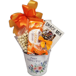 Happy Mother's Day gift basket loaded with chocolate, cookies, nuts, snack mix and more.  