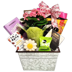 Mother's Day gift basket with sweet treats, cheese, crackers and a flowering plant.
