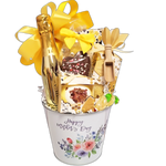 Mother's Day gift basket with bath fizzers, salts and shower steamers along with chocolate and sparkling wine too.  