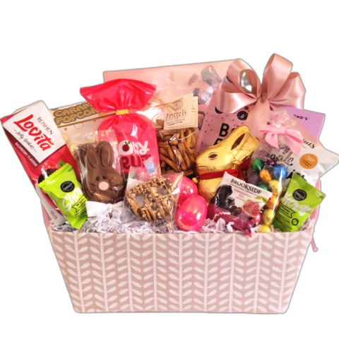 Peter Rabbit has loaded this pretty pink basket with all his favourites. There's lots of chocolate treats to enjoy along with shortbread, apple chips, tasty gummies, pretzels and popcorn too! Sure to satisfy all the Easter cravings.