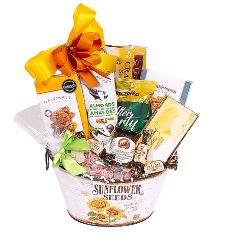Send a touch of sunshine with this pretty sunflower tin loaded with a delicious assortment of sweet treats including chocolates, biscuits, candy, sweet jam and more.