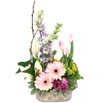 Soft pastel flowers are artfully designed in a pretty tin planter. A heavenly touch of fresh spring blooms. 