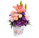 Make it Mom's best day with this Happy Mother's Day tin filled with beautiful roses, lilies and hydrangea too. A wonderful arrangement in pinks and purples.