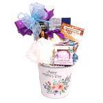 This pretty Mother's Day tin is loaded with a bit of sweets and a bit of pampering. There's chocolates and biscuits, a bath poof, soft bath fizzer and pretty soap too!