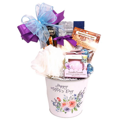 This pretty Mother's Day tin is loaded with a bit of sweets and a bit of pampering. There's chocolates and biscuits, a bath poof, soft bath fizzer and pretty soap too!