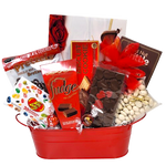 Explore an array of delectable treats, perfectly nestled within this gift basket. Savor pretzels, peanut brittle, jelly beans, fudge, cookies and more - a delightful way to celebrate Valentine's Day!