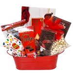 There's lots of scrumptious delights to enjoy nestled inside this one including pretzels, peanut brittle, jelly beans, fudge, cookies and more.  A special Valentine delight to receive! 