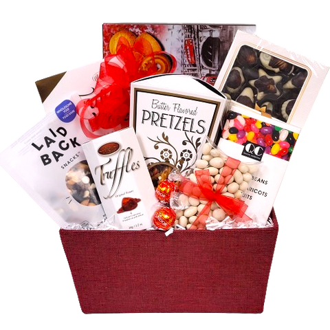 Experience a delectable selection of treats in our thoughtful gift basket filled with delicious biscuits, rich chocolates, savory pretzels, Laid Back snacks, indulgent truffles, and delightful jelly beans. Perfect for showing your love this Valentine's Day.