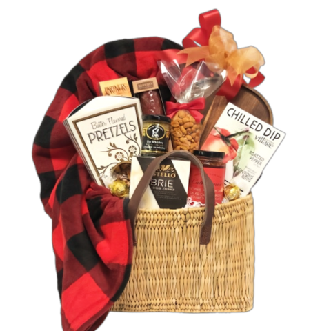 This basket includes everything needed to unwind and snuggle up with, perfect for sending warmth and loving comfort. A soft blanket awaits for snuggling, while a selection of gourmet treats such as crackers, cheese, red pepper jelly, dip mix, pretzels, mustard, and nuts provide delicious indulgence.