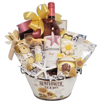 Pretty sunflower gift basket filled with bath salts, fizzers and sachets along with wine and sweet treats to enjoy.