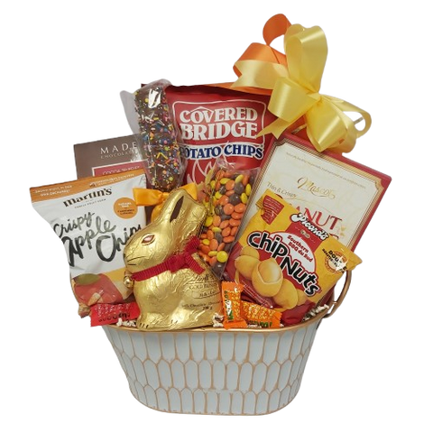 This Easter gift basket is for the "Nibbler" who is sure to enjoy this bounty of sweet and salty treats. Whether they're young or young at heart they'll love all the treats to indulge in! A beautiful Easter basket to give and to receive!