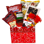 Celebrate love this Valentine's Day with our Sweet & Salty gift basket. This thoughtful selection of treats offers the perfect balance of indulgent sweetness and satisfying saltiness. Treat your special someone this Valentine's Day with our irresistible treats.