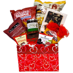 This one's overflowing with sweet and salty snacks. Your Valentine will enjoy tortilla chips and salsa, sweet scrumptious chocolates and fudge, truffles, nuts, potato chips and popcorn too.  All nestled in our designer heart box to send your loving wishes. 