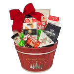 Send your warmest wishes with this festive designed wood gift basket. It's filled with all sorts of goodies to enjoy. There's pancake mix and maple syrup, specialty coffee and tea, biscotti and cookies, Chiwis' fruit chips, truffles and more.