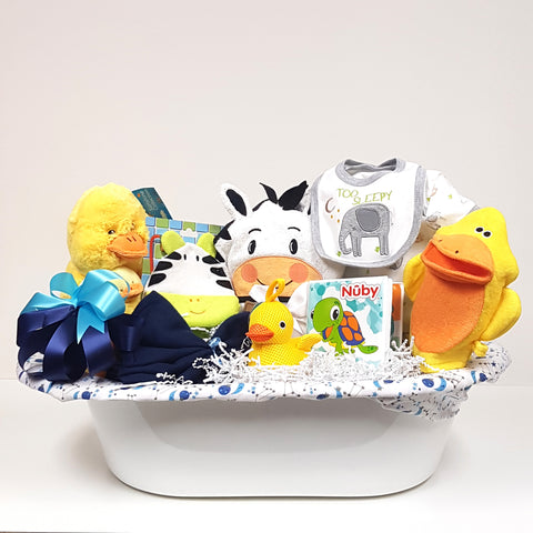 A bath tub gift basket brimming with Nuby's bath book, duckie sponge, animal hooded towel, Mama duck & baby plush, receiving blankets, onesie, baby bib and animal wash cloths too!