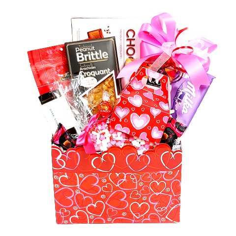 Our Valentine's designed box filled with all kinds of sweet treats to enjoy. There's chocolate pretzels, peanut brittle, candy, cookies and chocolates galore!