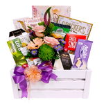 Our pretty white crate gift basket comes filled with a beautiful floral arrangement and a wonderful assortment of sweet & salty treats, cheese & crackers and some to tea to enjoy. So much to savour!