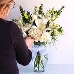 Our creative designer's will create a beautiful vase arrangement filled with luscious blooms that will bring a touch of splendor to any occasion! If you'd like a specific colour theme, mention it in the special instructions. We'll do our best to accommodate your colour theme request based on current in stock availability of blooms.