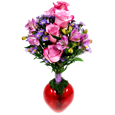 Heart shaped glass vase with topiary of alstromeria, pink roses and asters.