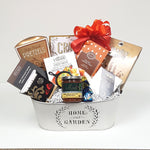 A keepsake tin housewarming gift filled with crackers and cheese, salsa, dip mix, chocolates, pretzels & more. 