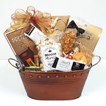 A beautiful tin gift basket brimming with peanut brittle, moose munch, nuts, truffles and pretzels too.