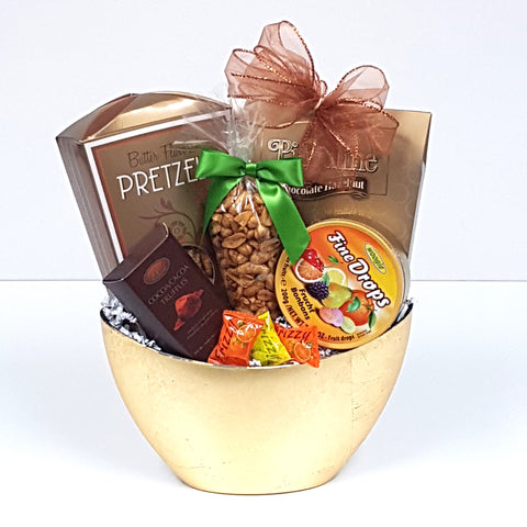 A pretty golden half moon gift basket filled with sweet & salty treats to soothe the soul. 