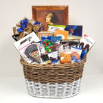 A sweet & salty gift basket containing European chocolates, Uglies potato chips, chocolate seashells to Martin's apple chips, Godiva chocolates, nuts, pretzels, salsa and much more