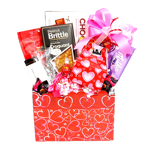 Indulge in an abundance of Valentine's treats with our Sweet Delight gift basket. Featuring an array of scrumptious treats, this Valentine's basket is carefully curated to provide the perfect balance of flavors to make your Valentine's special.