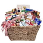 You're sure to impress with this basket filled with the Whole Kit & Kaboodle! There's red pepper jelly, cheese, crackers, chocolate, salsa, coffee, salmon, truffles, tea, nuts, cookies, peanut brittle, shortbread, party snack mix, hot chocolate and even more! This one's pretty huge and is sure to create lots of excitement!